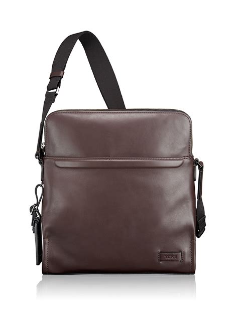 tumi bags official website.